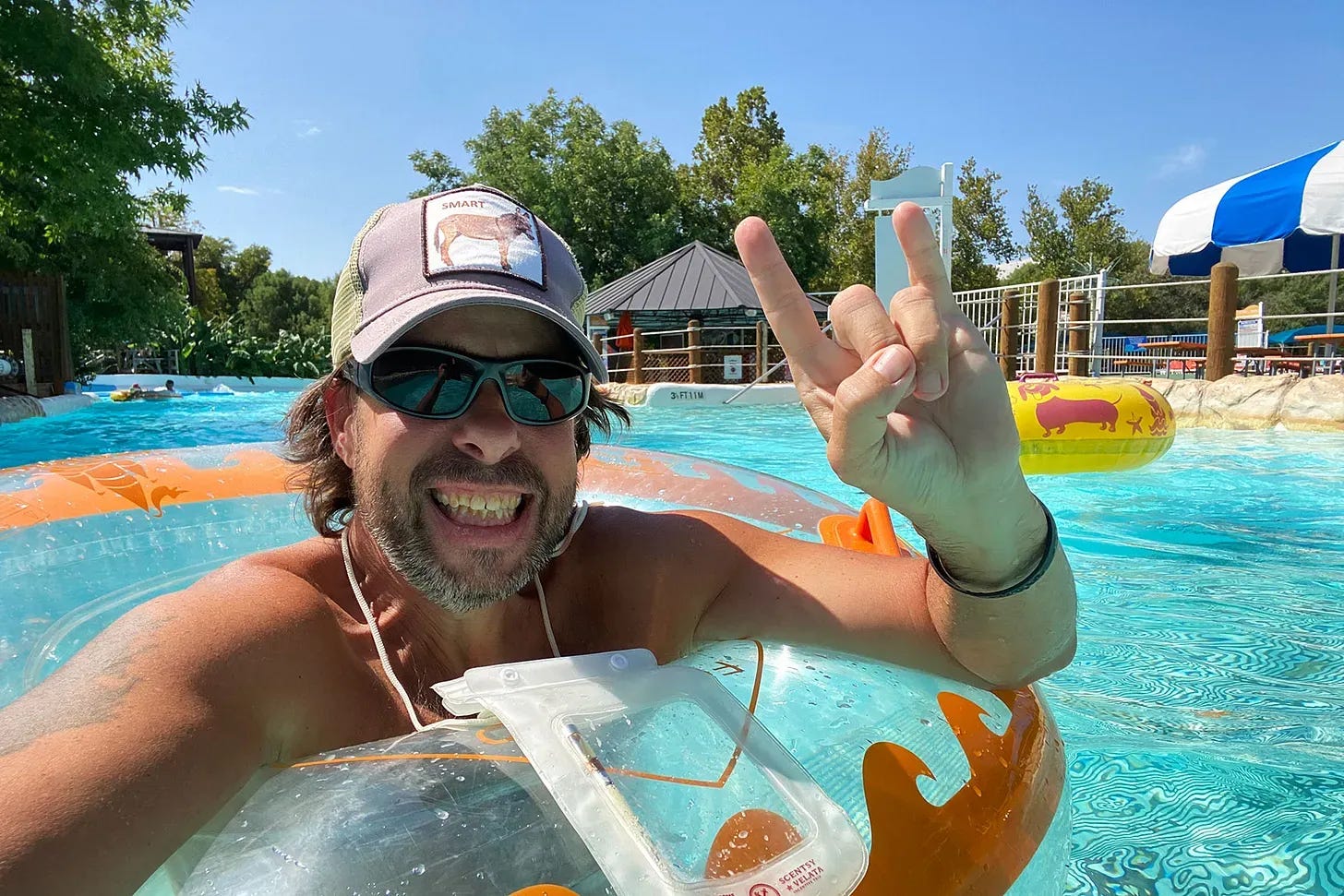 James floating the lazy river having a great time.